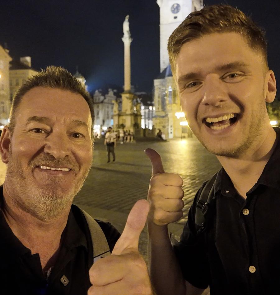 Adam and Edoardo on Old Town Square at night